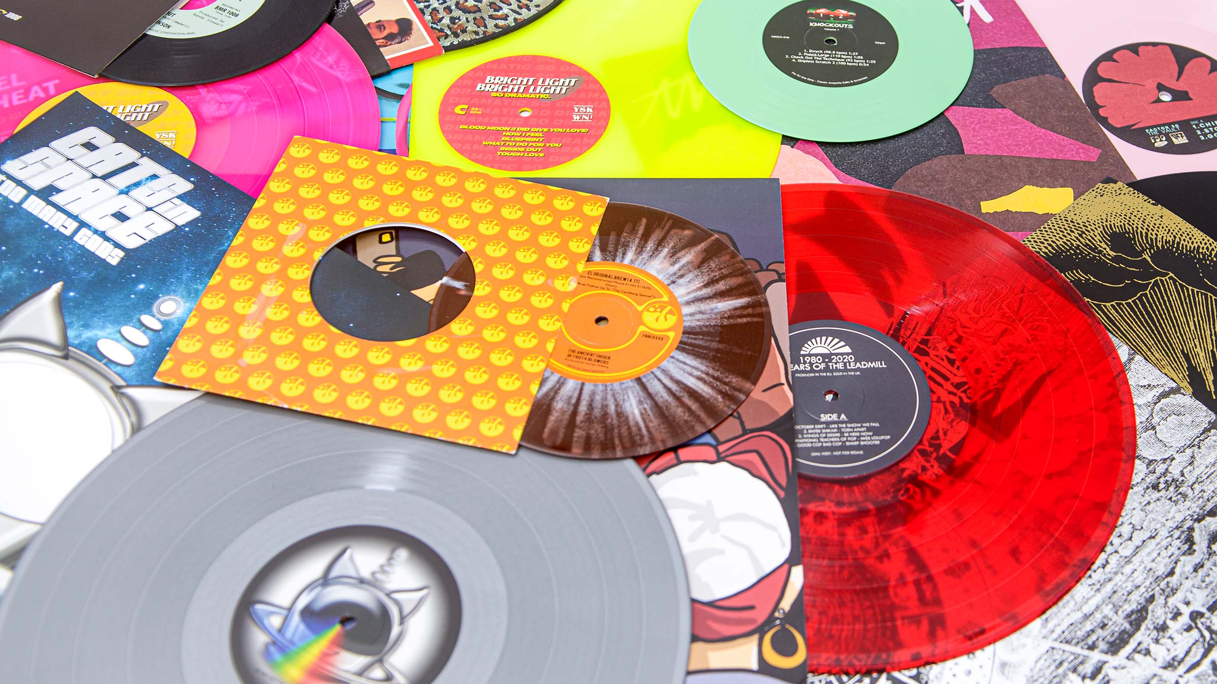 Coloured vinyl records and colourful sleeves